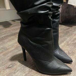 Sleek Black Heeled Boots for Women